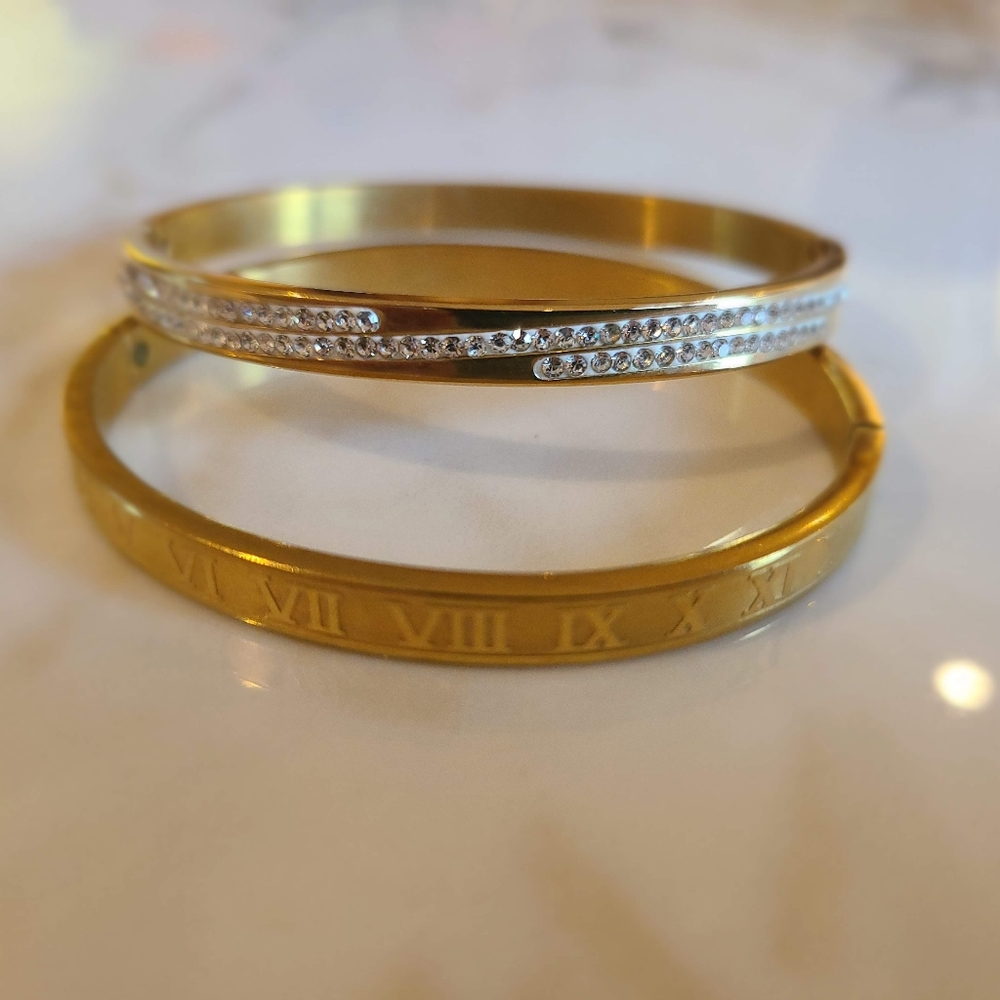 2 fabulous bracelets with gold tones.
